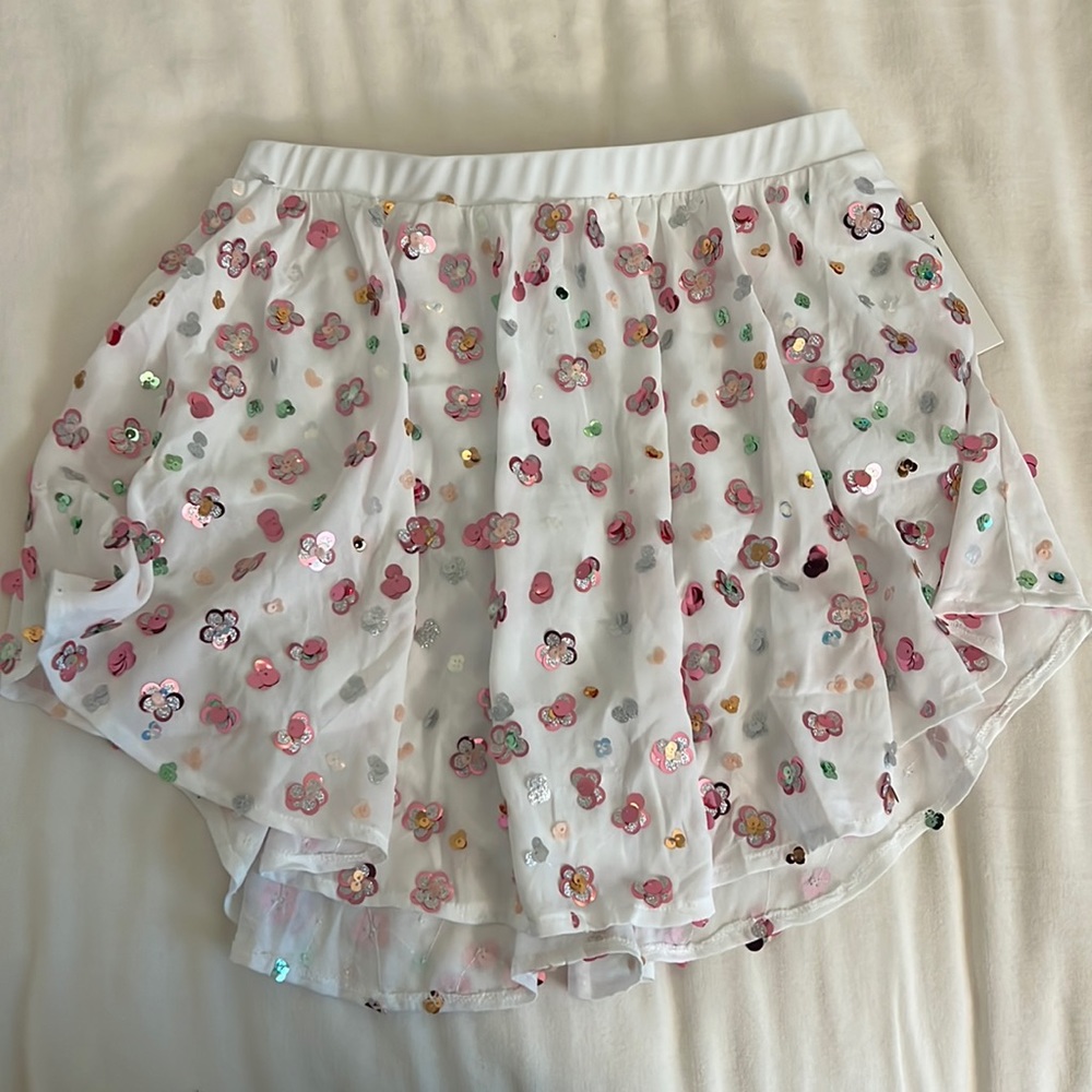 New for love & lemons skirt, tags attached. Semi sheer + built in underwear.